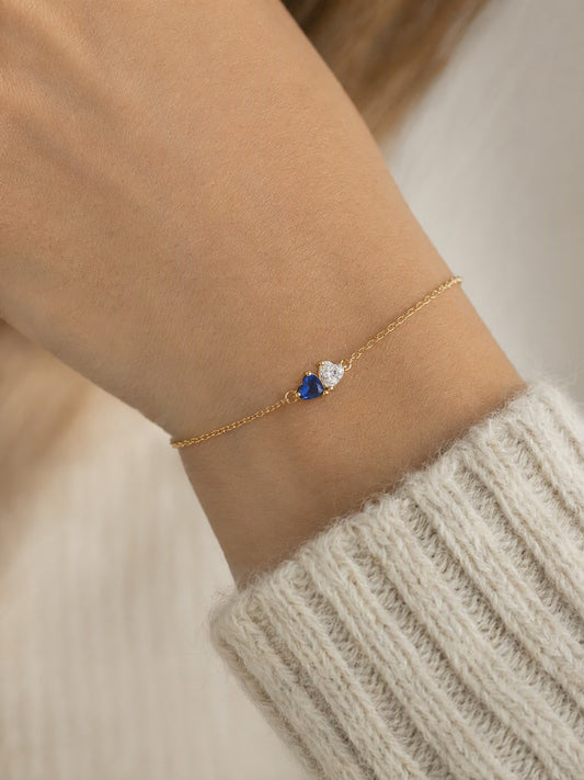 SAINT GILD two birthstone bracelet on wrist