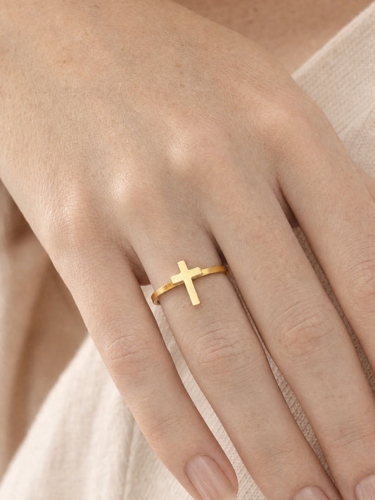 SAINT GILD Cross Ring on finger