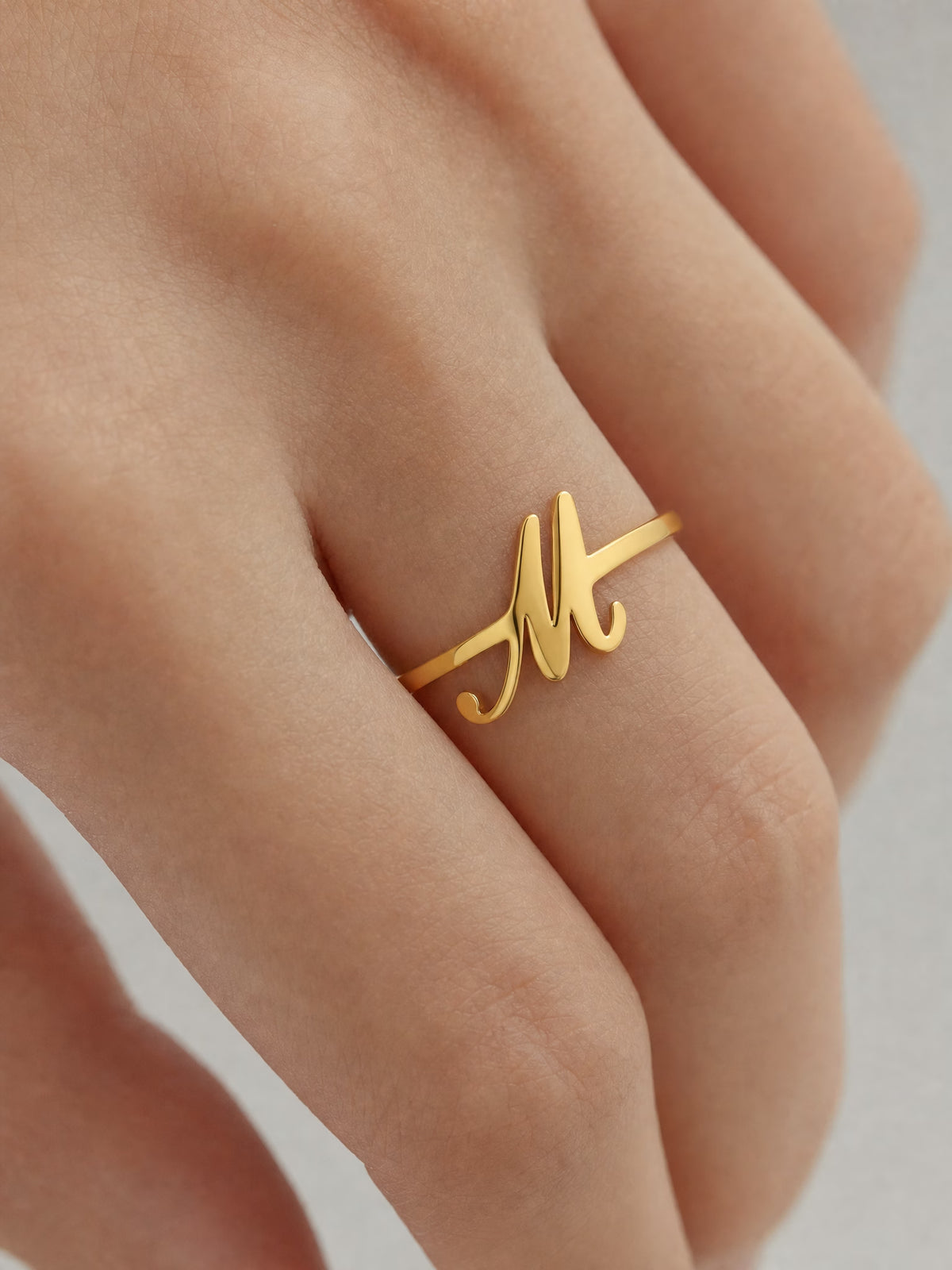 SAINT GILD initial ring macro detail