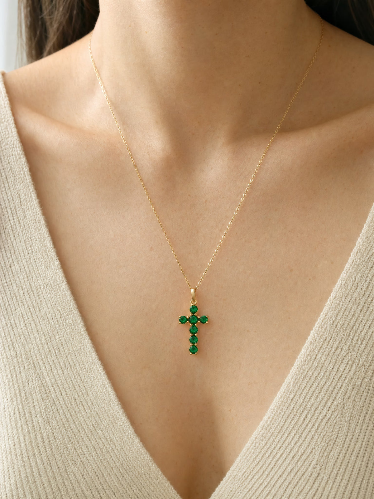 SAINT GILD birthstone cross necklace worn on body