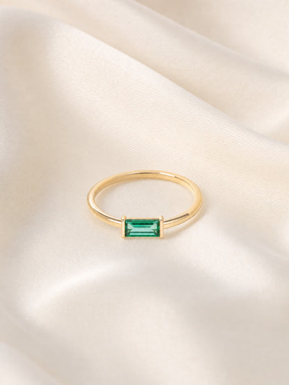 SAINT GILD birthstone ring flatlay on satin