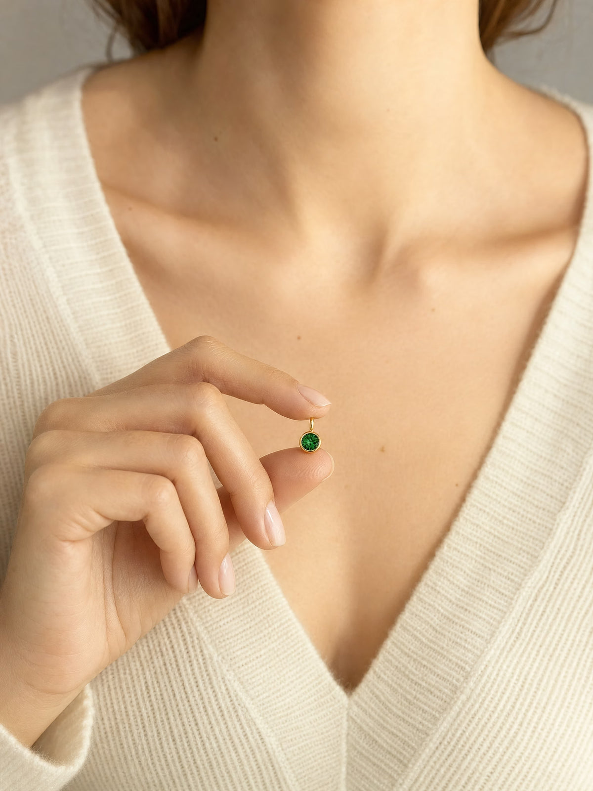 SAINT GILD birth month charm worn on body