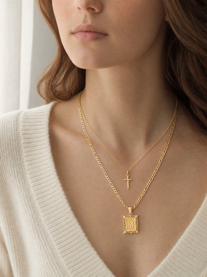 SAINT GILD initial cross necklace set lifestyle
