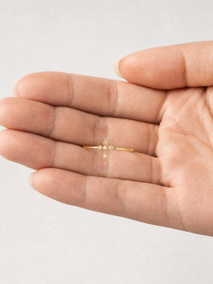 SAINT GILD Dainty Cross Band Ring in hand
