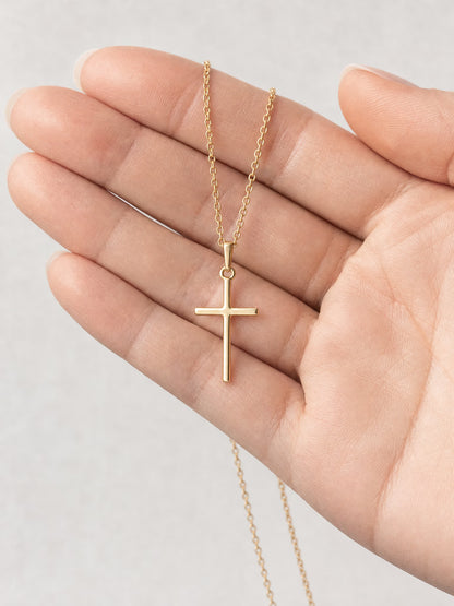 SAINT GILD Classic Cross Necklace in hand