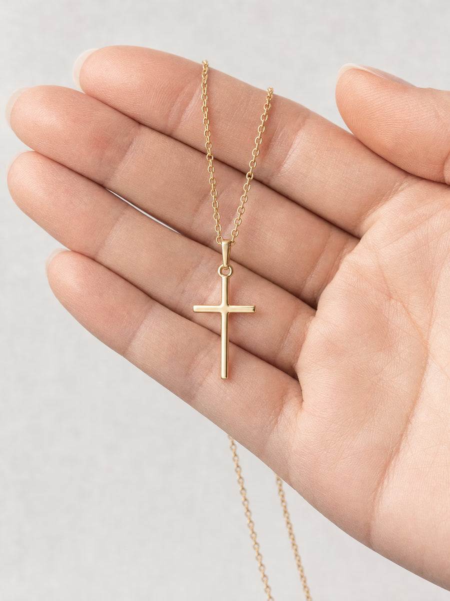 SAINT GILD Classic Cross Necklace in hand