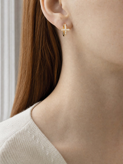 SAINT GILD Pave Cross Huggie Earrings worn