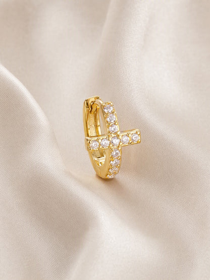 SAINT GILD Pave Cross Huggie Earrings on satin