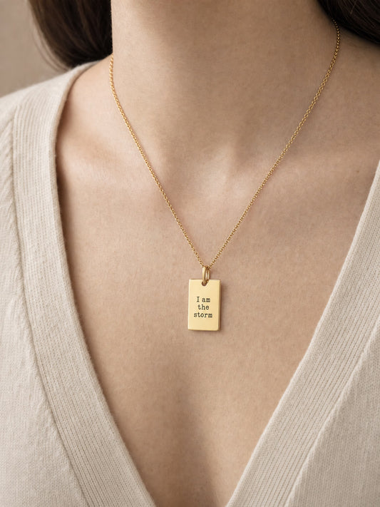 SAINT GILD Scripture Tag Necklace on neck