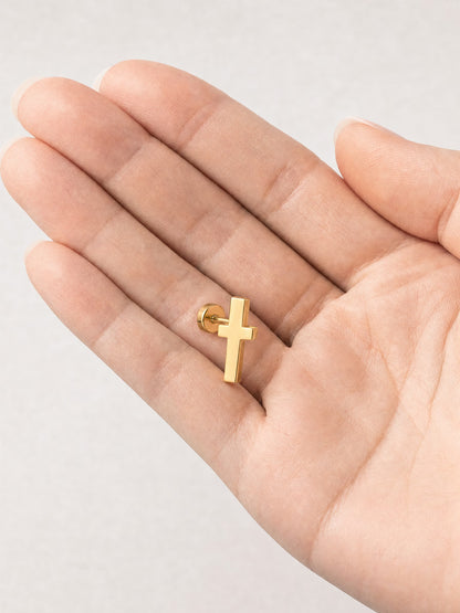 SAINT GILD Cross Stud Earrings in hand