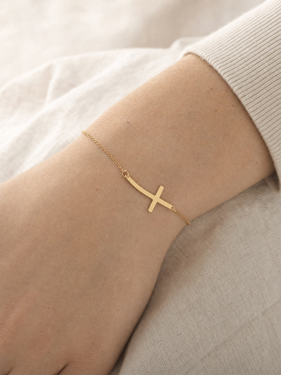 SAINT GILD Sideways Cross Bracelet on wrist