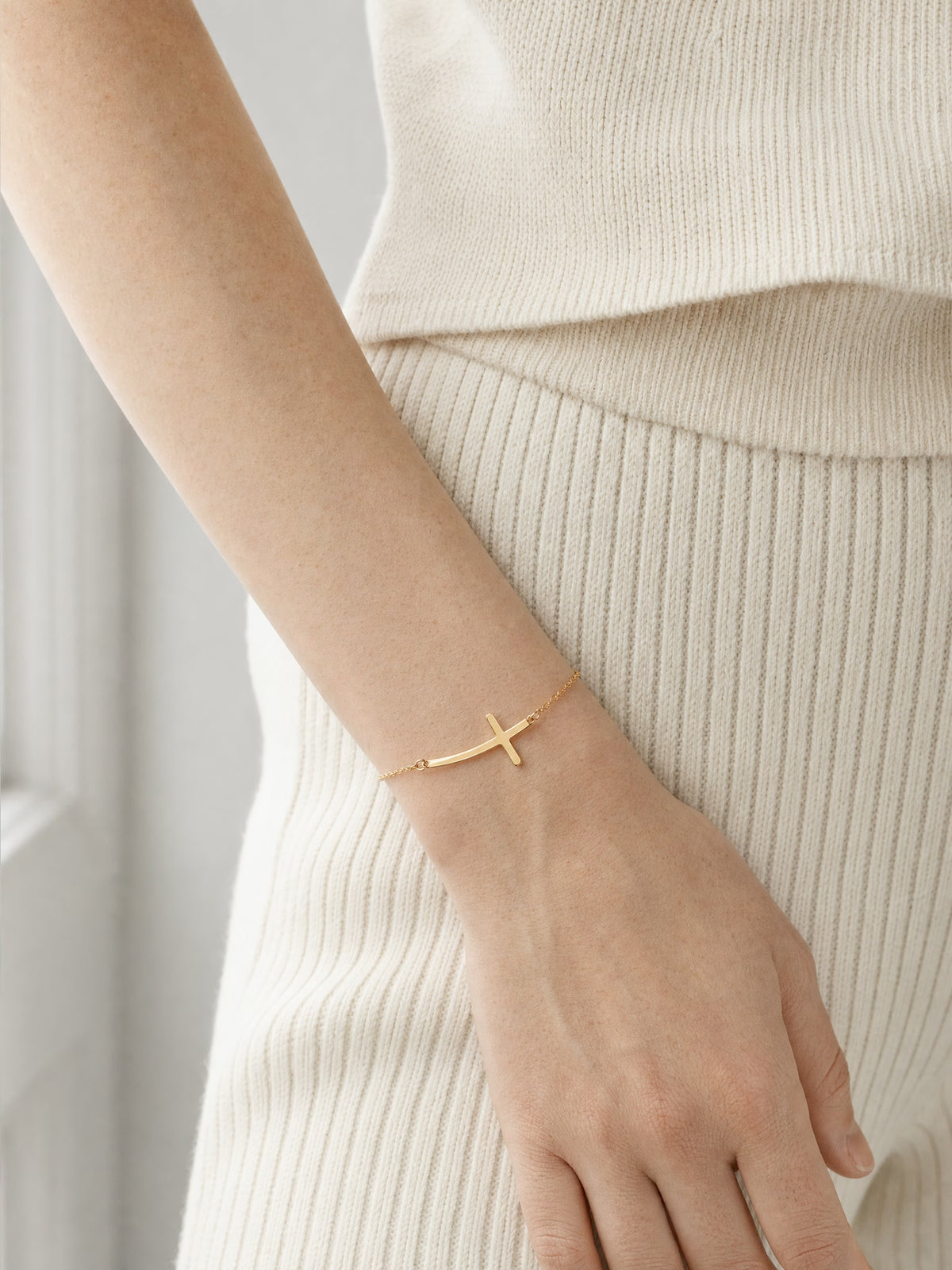 SAINT GILD Sideways Cross Bracelet worn